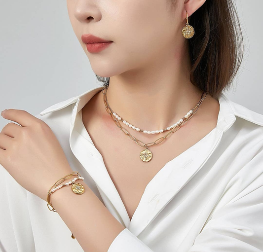 Pulseira Unity em aço dourado